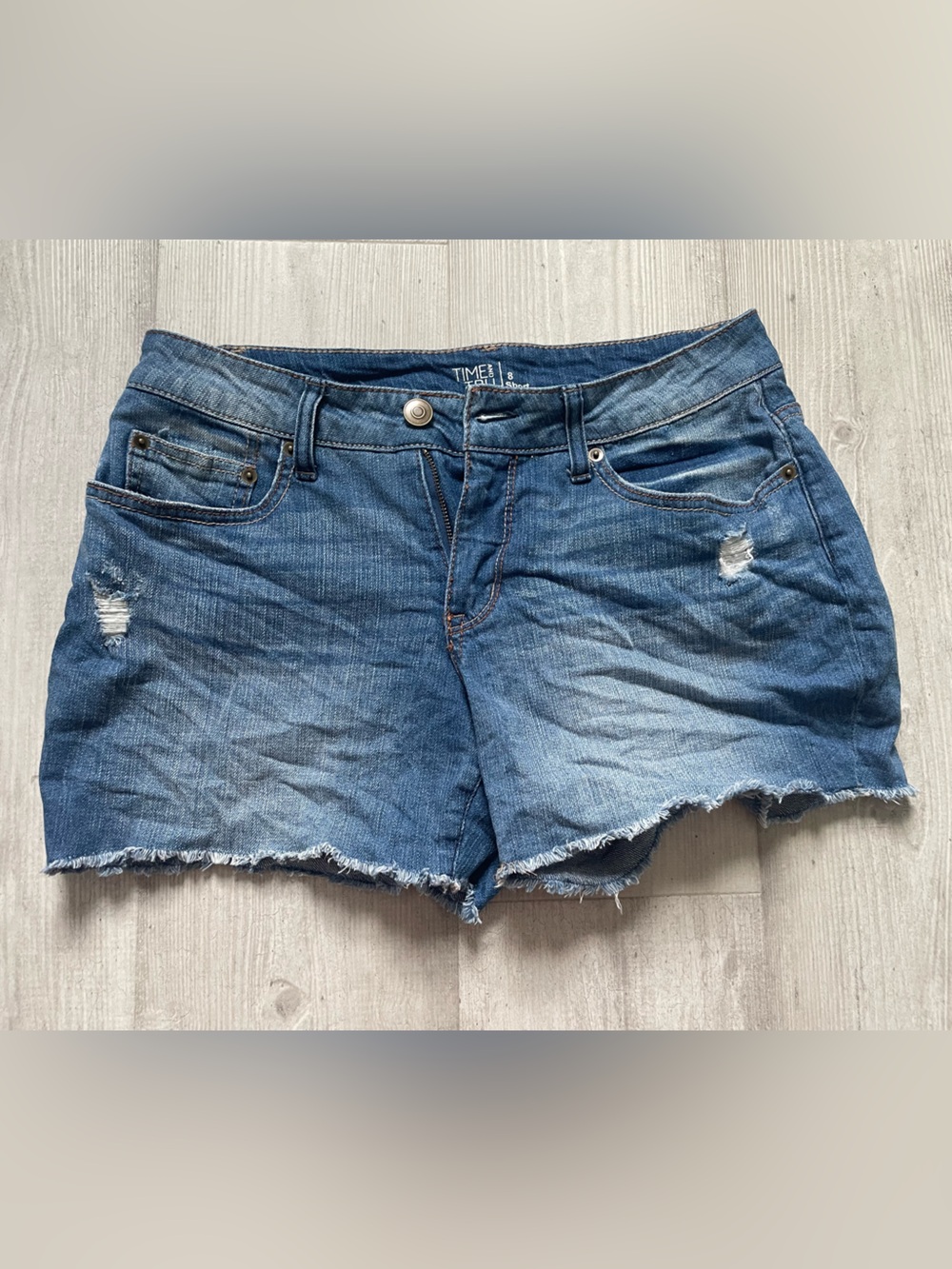 Time and Tru Blue Distressed cut off shorts